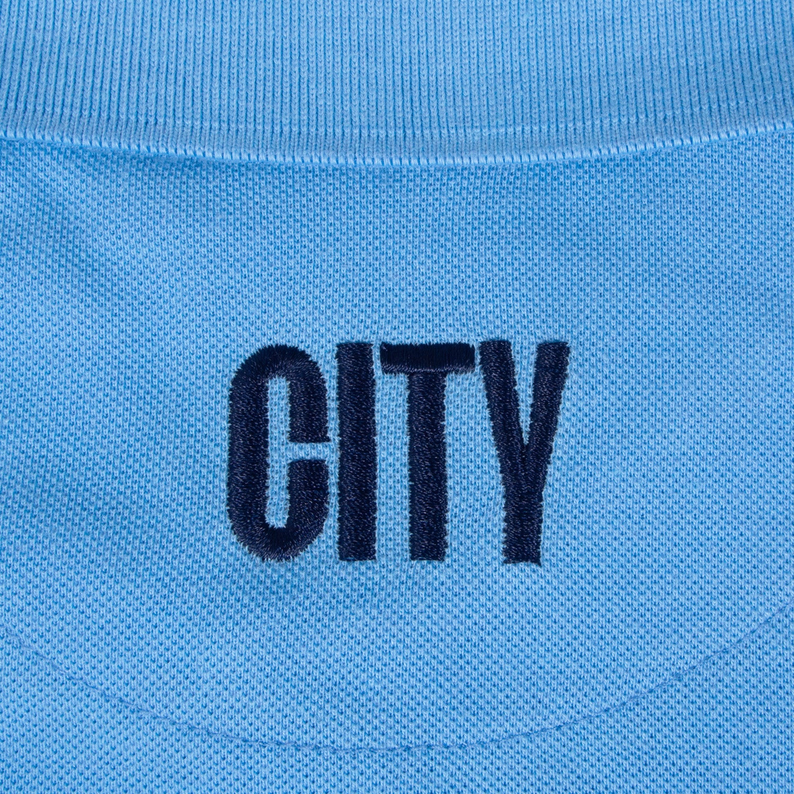 Man City kids polo shirt in grey with club crest to the chest.