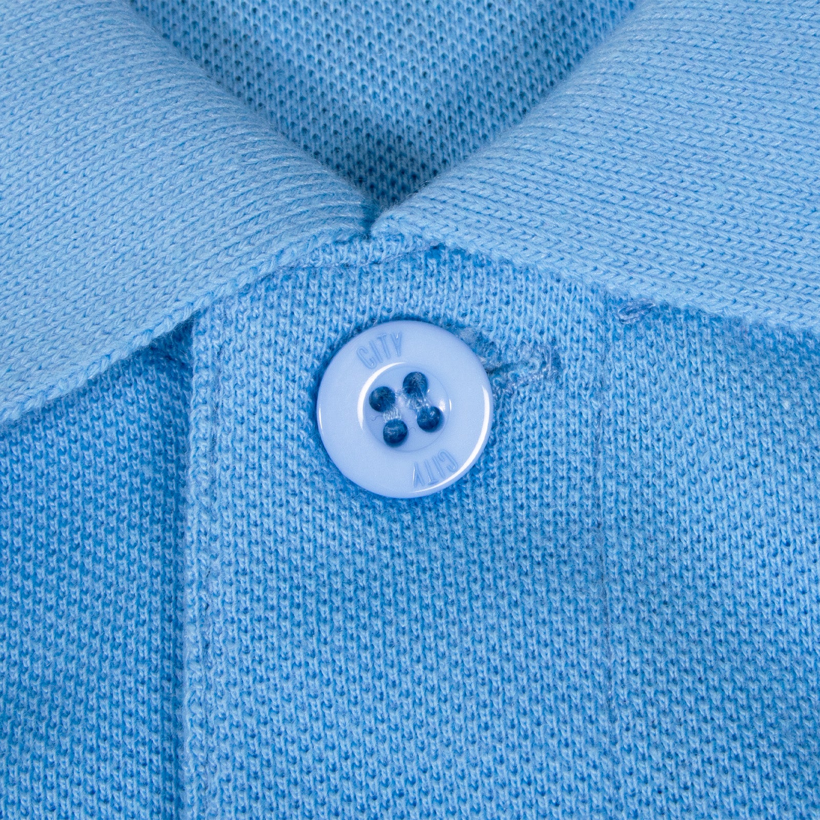 Man City kids polo shirt in grey with club crest to the chest.