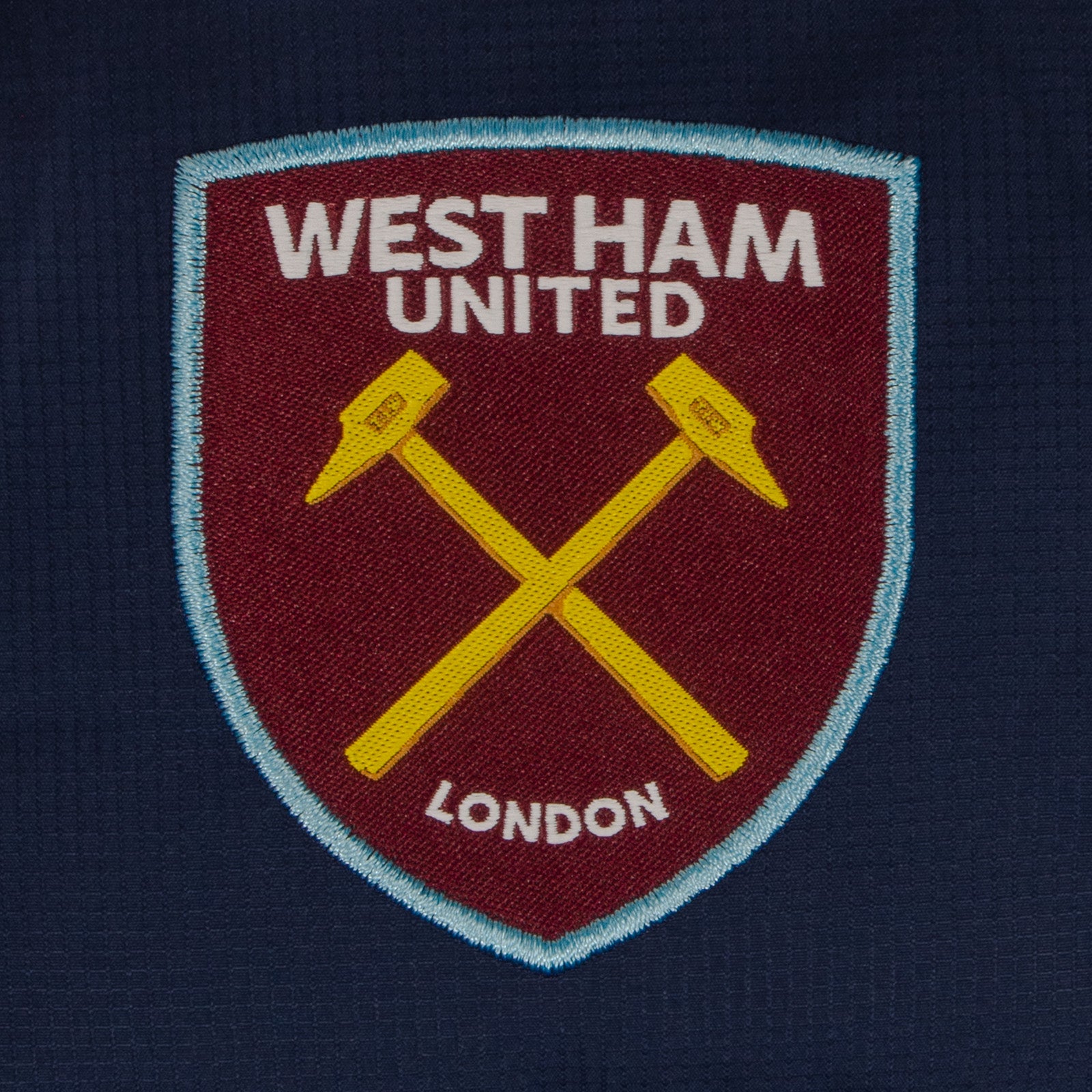 West Ham adults quilted jacket in navy with club crest to chest.