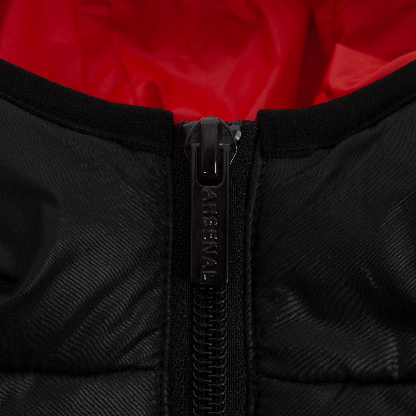 Arsenal kids quilted jacket in black with club crest to chest.