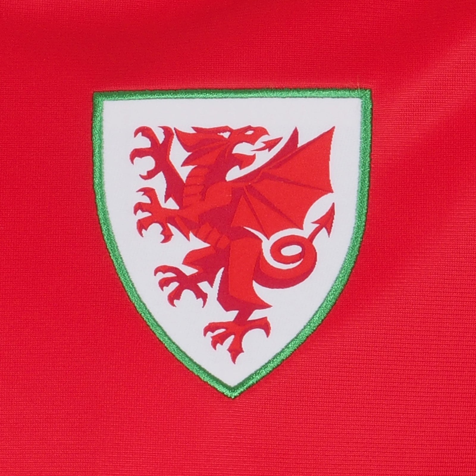 Wales adults retro track jacket in red with Wales FA crest to chest.