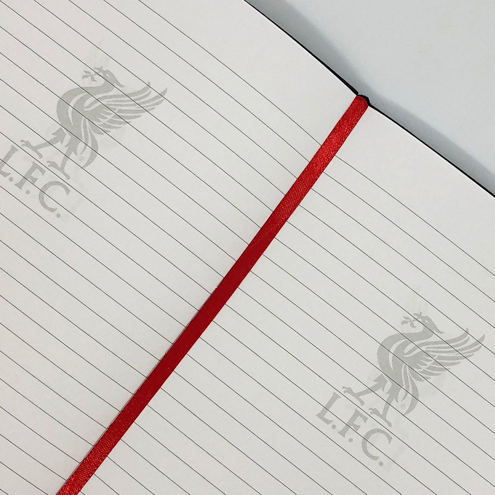 Liverpool notebook & pen in black with silver foil crest in club design gift box.