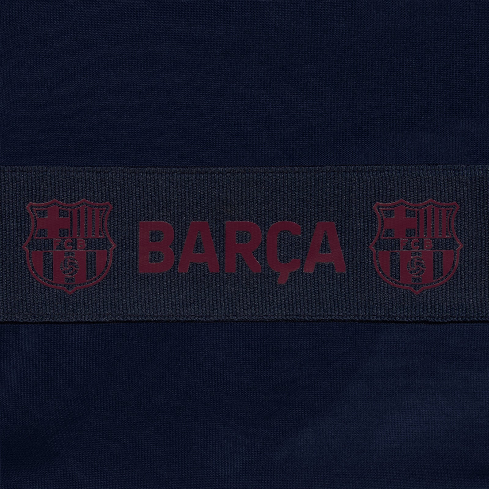 FC Barcelona kids taped tracksuit in navy blue with club crest and text to both top & pants