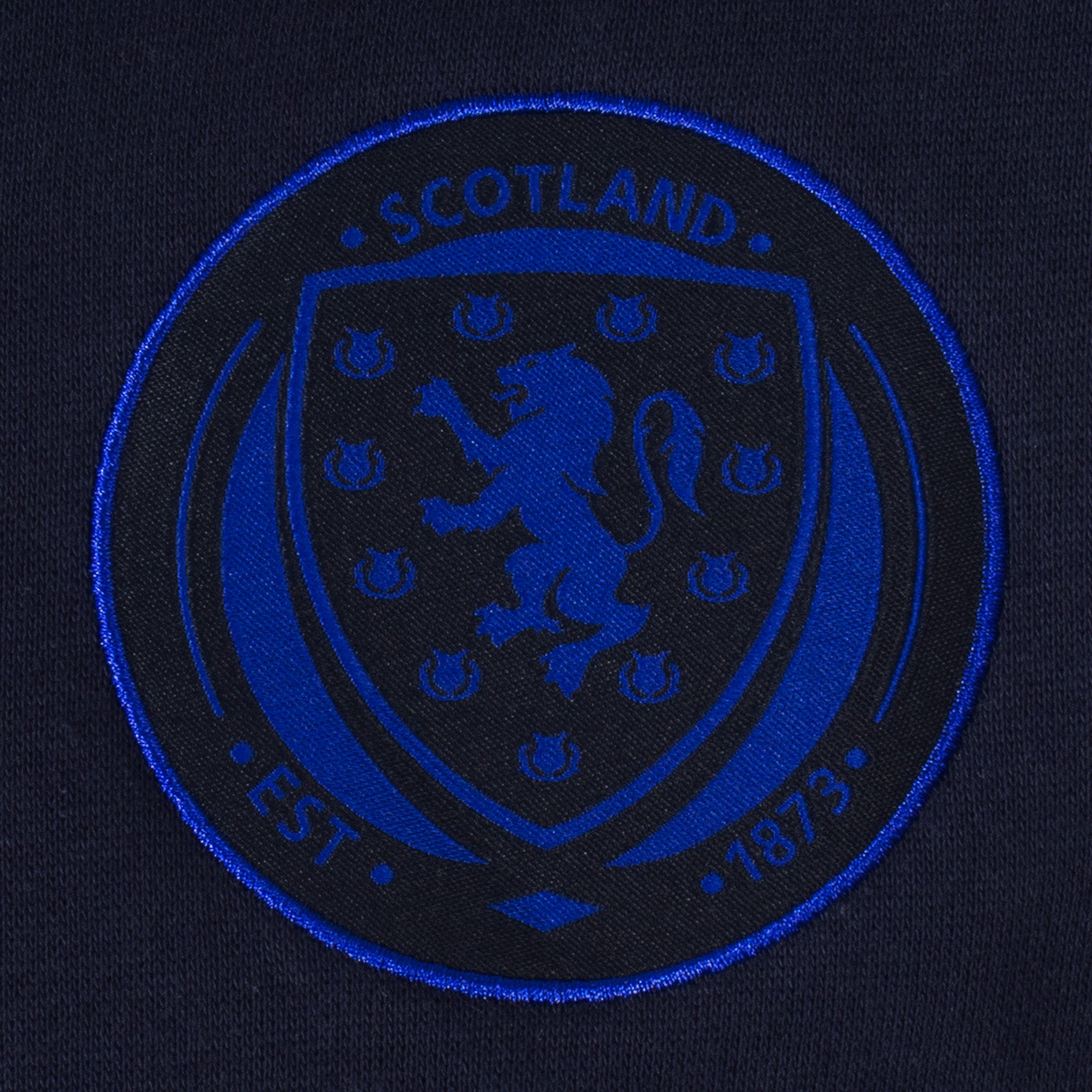 Scotland adults taped sweatshirt in navy blue with national team crest to chest and text to sleeves.