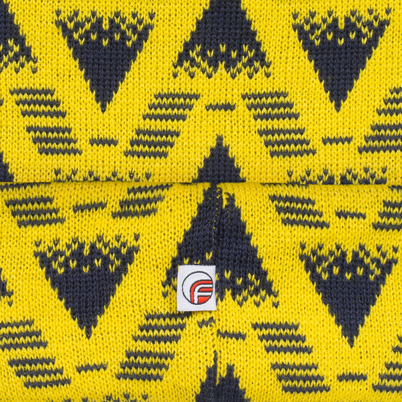 Arsenal retro knitted beanie hat in yellow with text to front