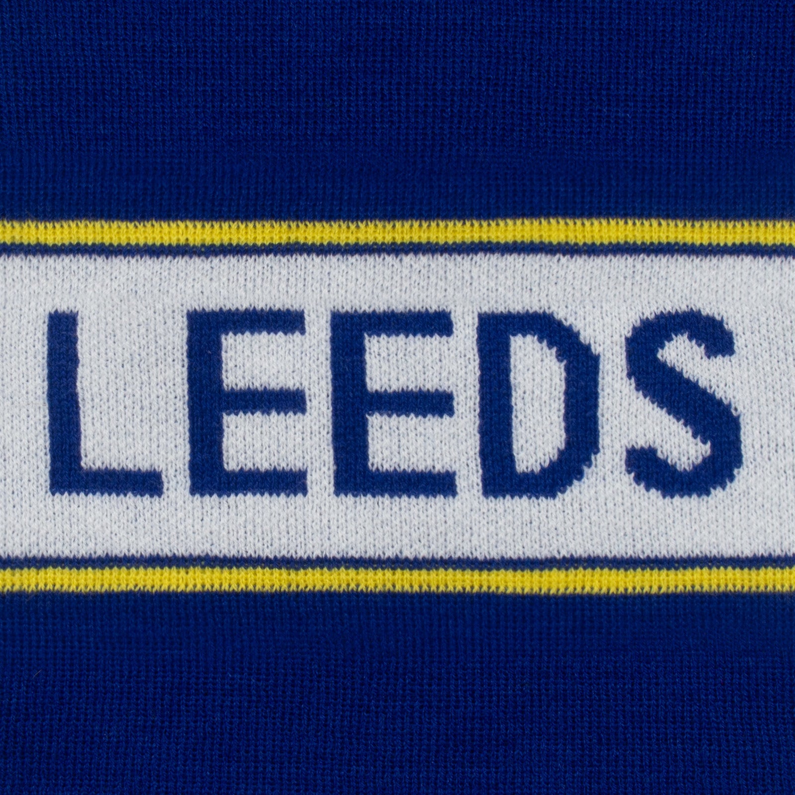 Leeds United knitted bobble hat in blue with text to front