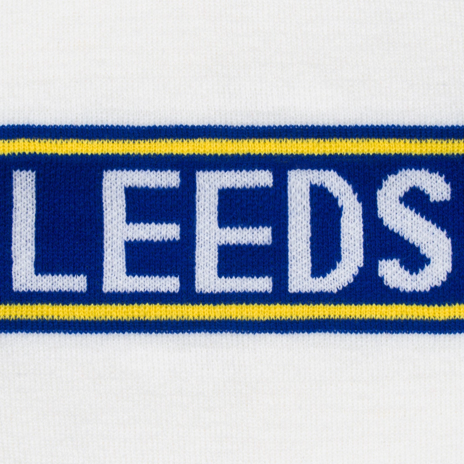 Leeds United knitted bobble hat in white with text to front