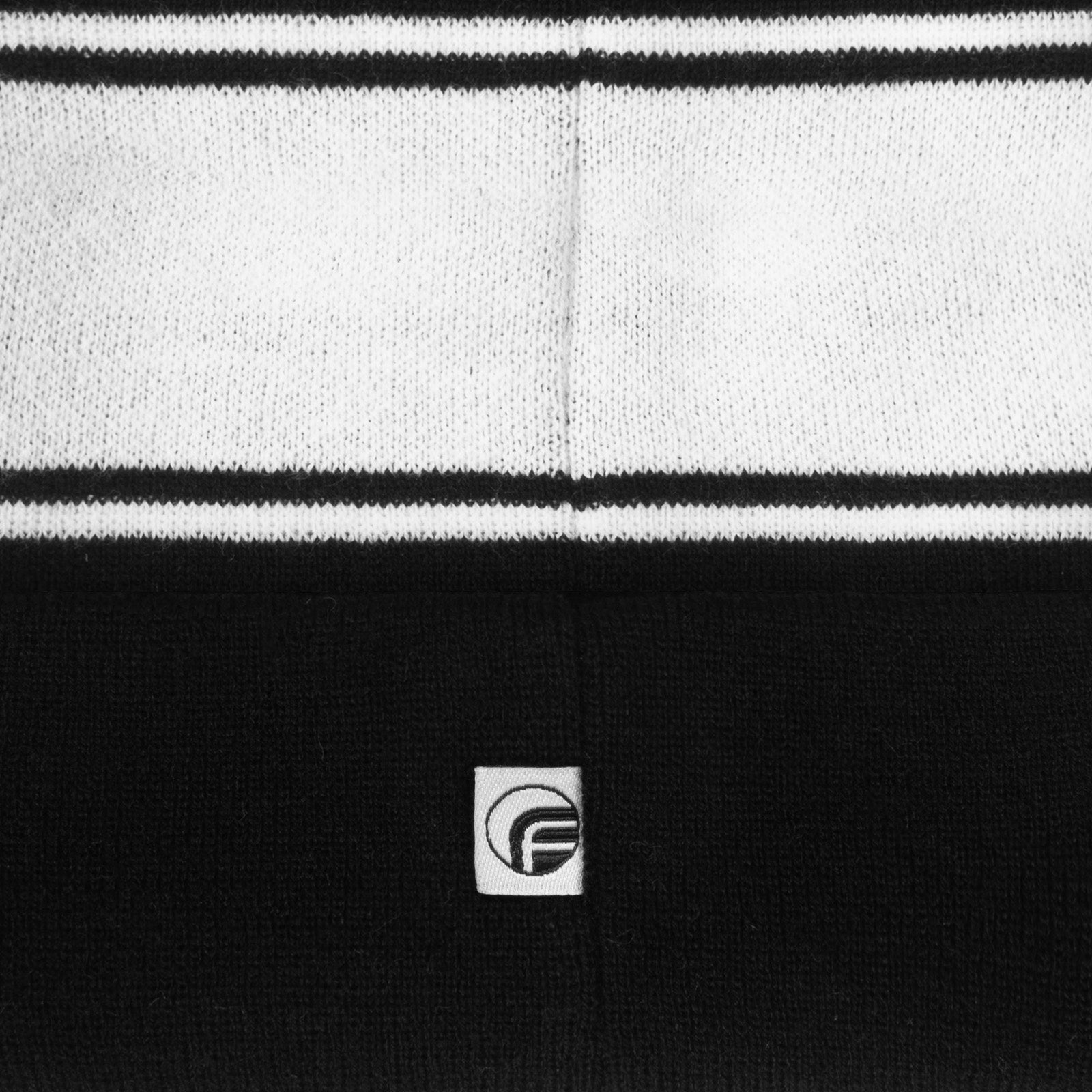 Newcastle United knitted bobble hat in black with text to front