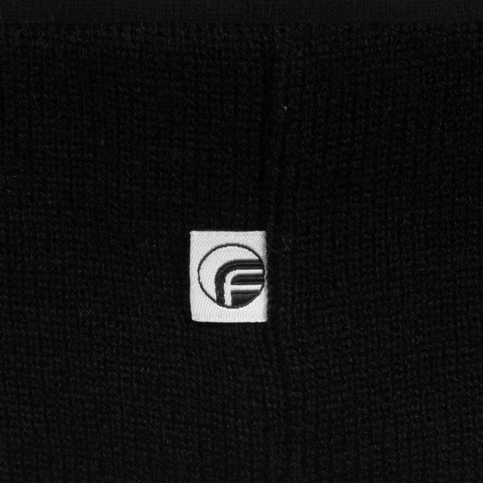 Newcastle United knitted bobble hat in black with text to front