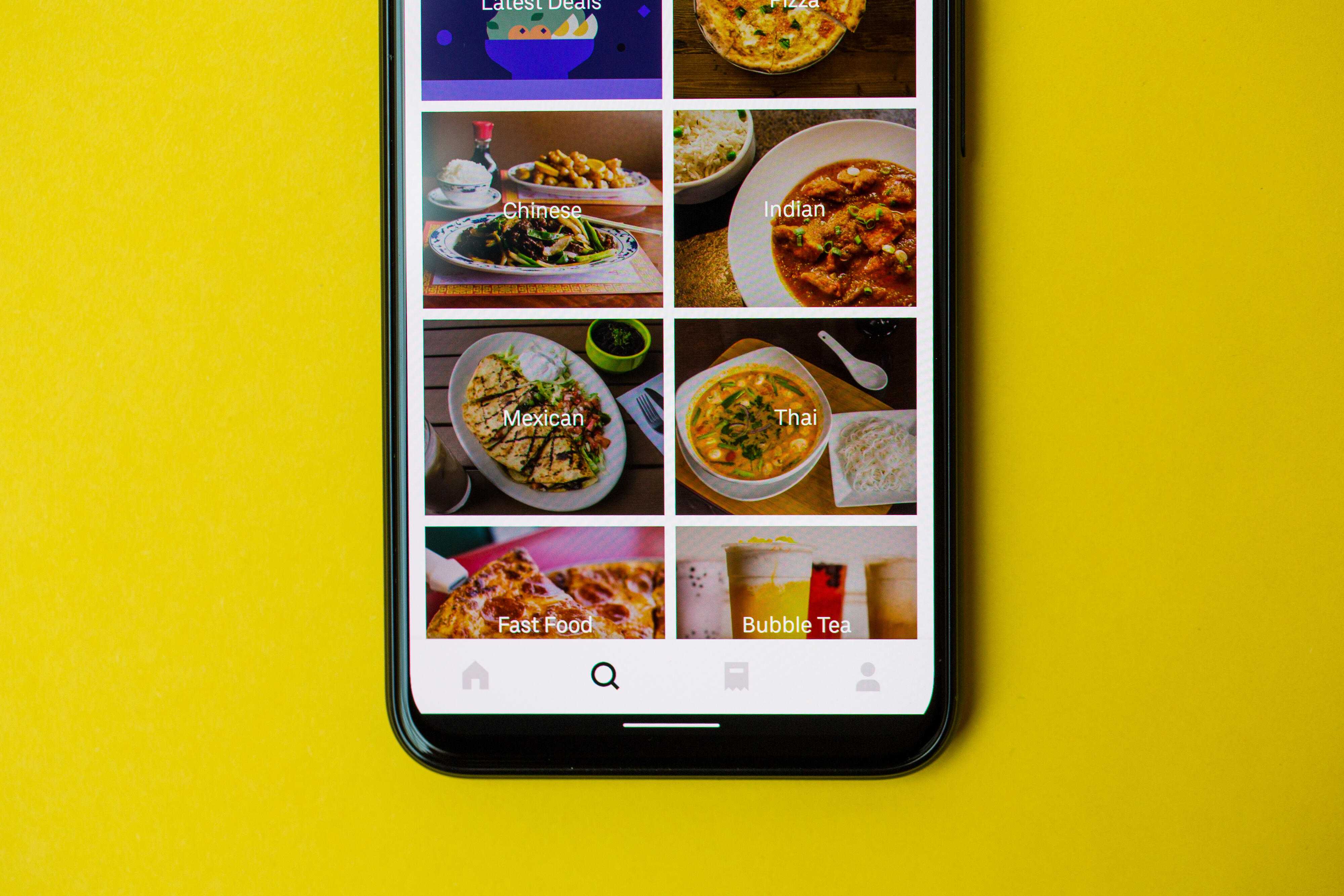 A phone showing the Uber Eats app