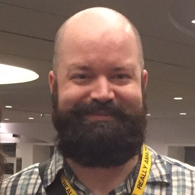 Headshot of Adam Bolton