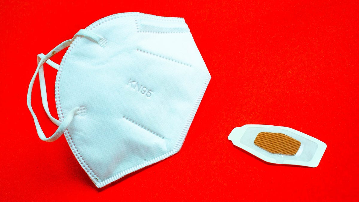 covid-19-masks-booster-shots-vaccines-syringes-bandaids-winter-2021-cnet-066