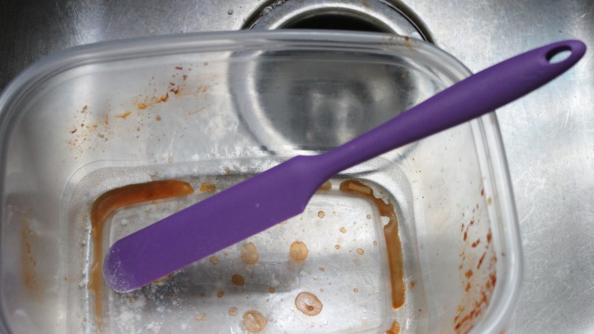 scraping dishes before putting them in dishwasher