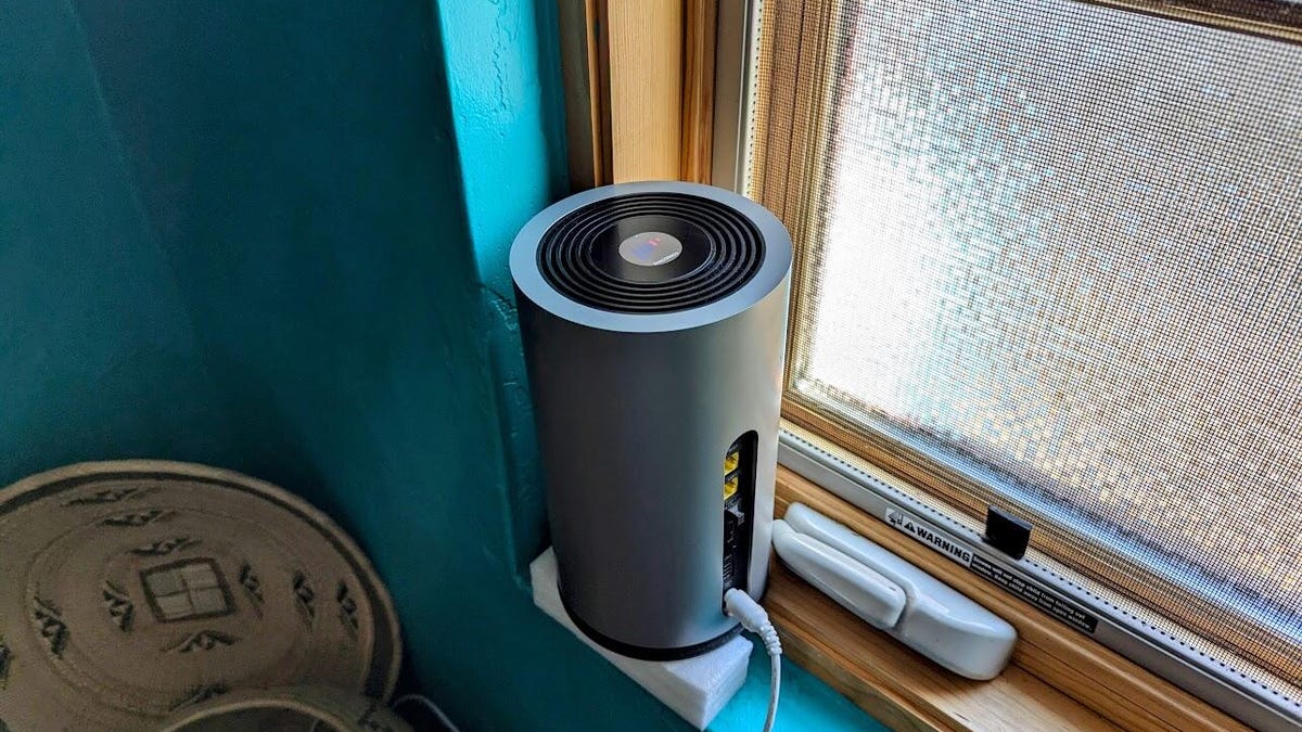 T-Mobile Home Internet gateway located on a window sill.