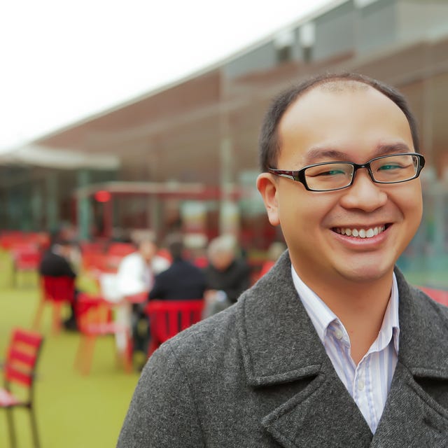 Headshot of Aloysius Low