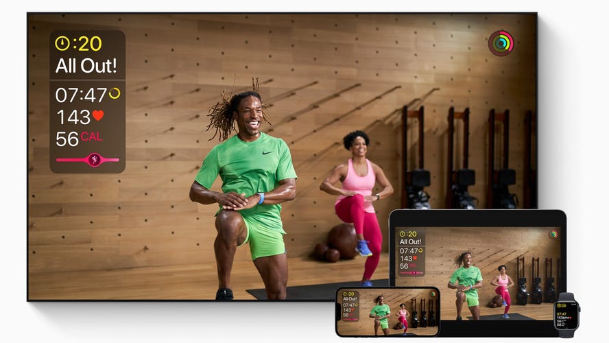 two people are indoors and one leads the other in an apple fitness plus hiit workout