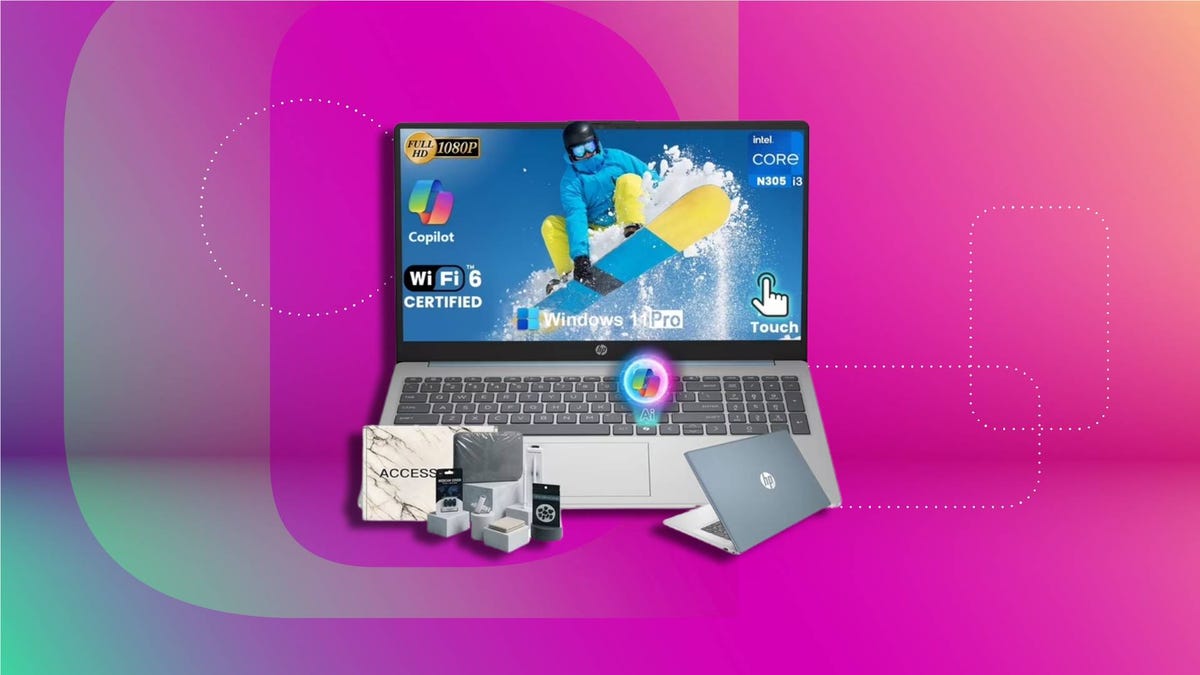 15.6-inch touchscreen laptop with Intel Core i3, 16GB RAM, 512GB SSD, silver design, numeric keypad, and anti-glare display on CNET background