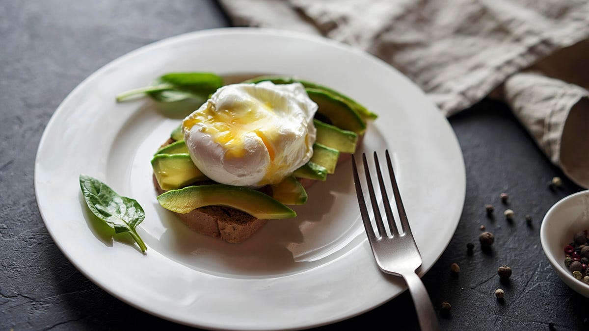 poached egg over avocado on toast