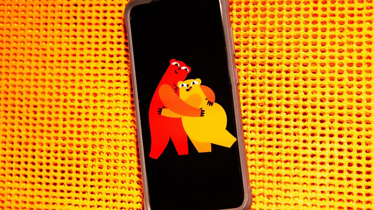 Android phone with two bear illustrations.