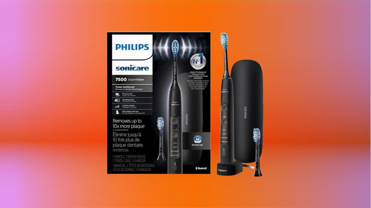 Philips Sonicare ExpertClean 7500 toothbrush in black on an orange background.