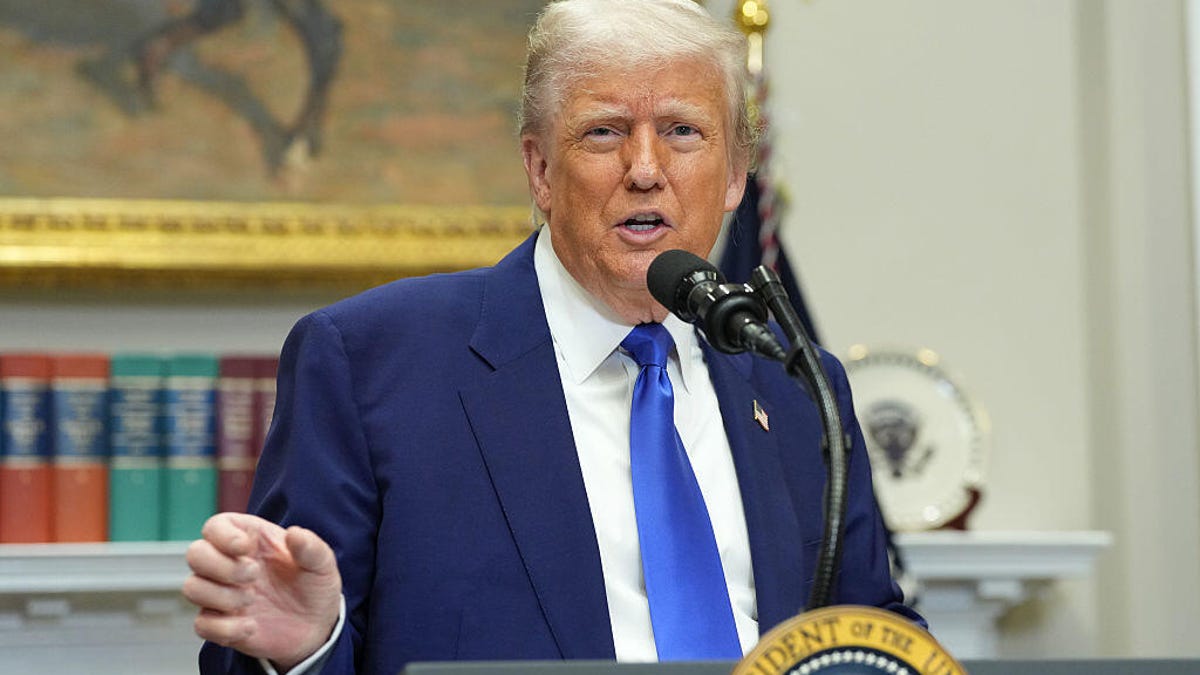 Donald Trump standing in front of a podium.