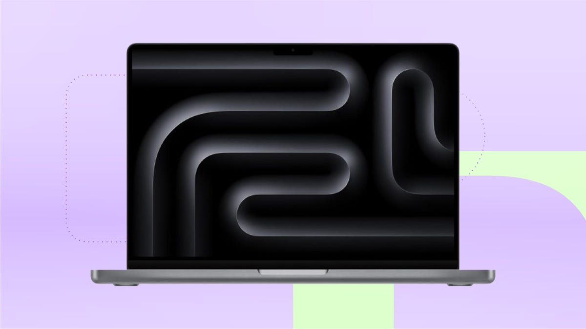 grey macbook pro against lavender and mint green background