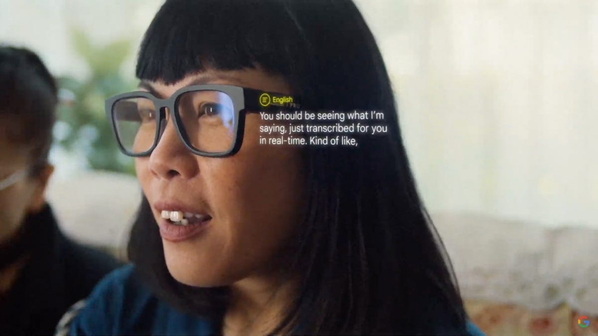 Woman wearing Google prototype smartglasses