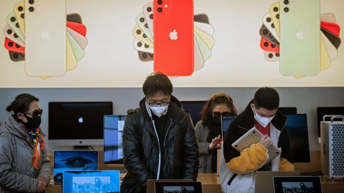 Shoppers in the Beijing Apple Store