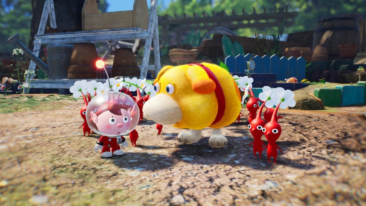 Screenshot of Pikmin 4 video game, showing flower-headed red pikmin, a space dog, and a helmeted space explorer.