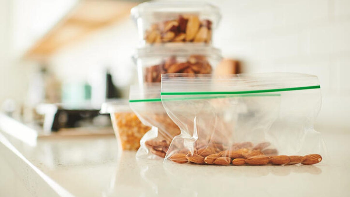 Plastic storage bags with food in them sitting on a counter
