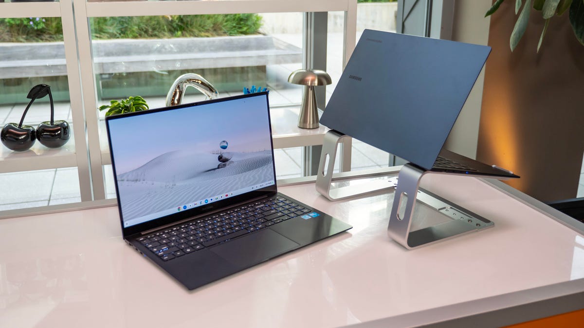 Samsung Galaxy Chromebook Plus sitting on a white table.