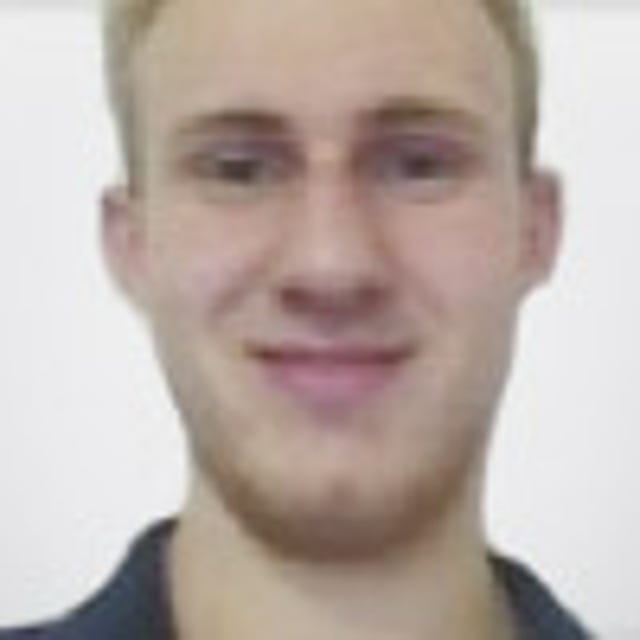 Headshot of John Thompson