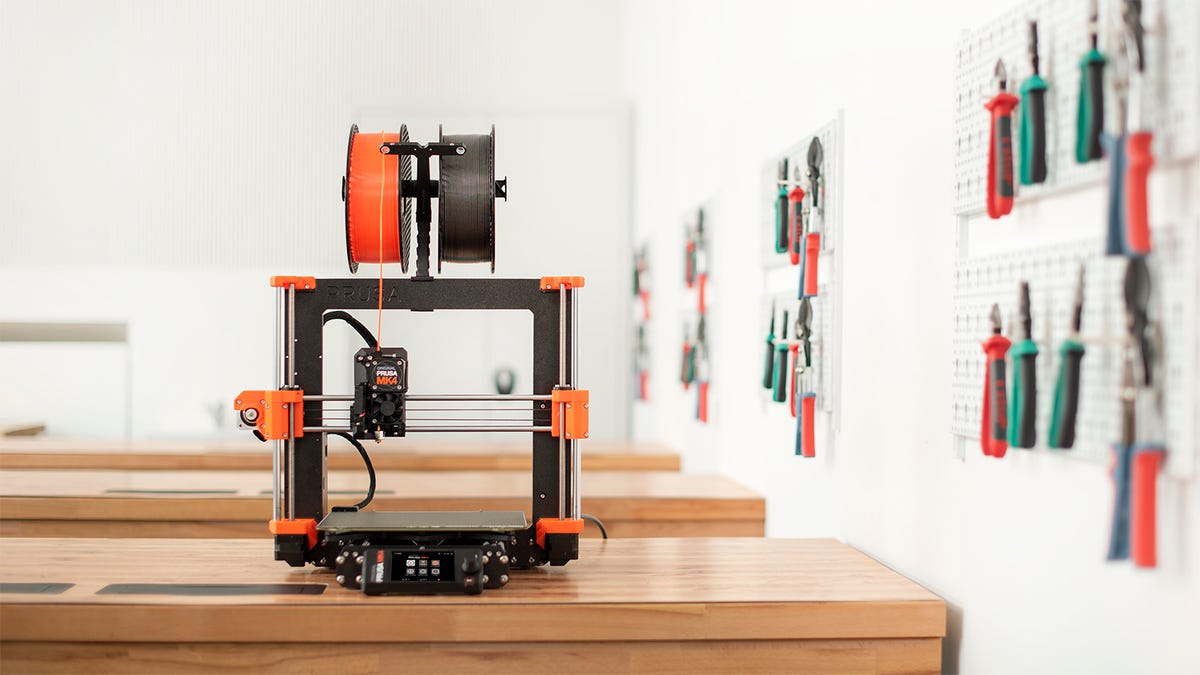 The Original Prusa MK4 in a very clean classroom