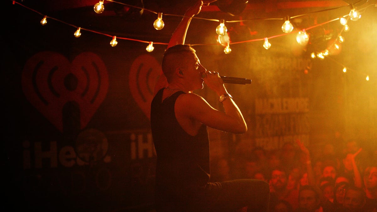 Macklemore performs on stage