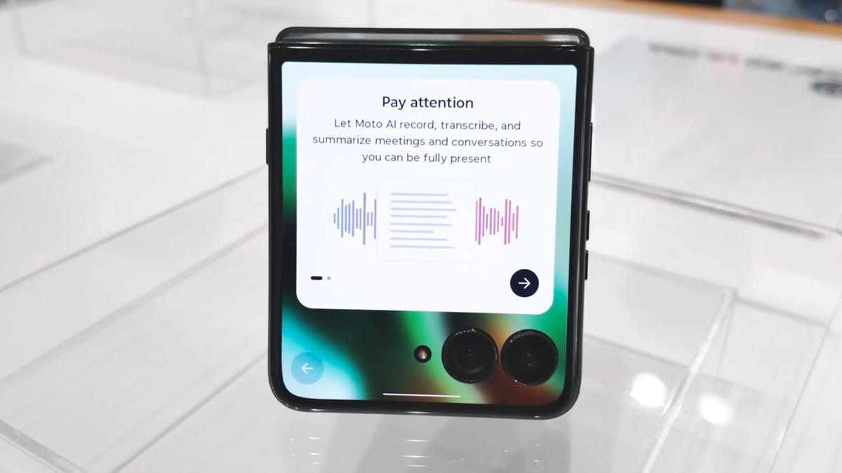 A Motorola Razr 2025 with Moto AI on its cover screen