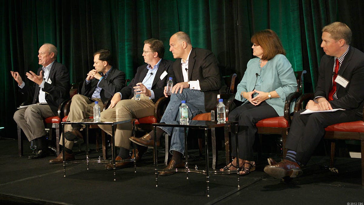 caption: Verizon executive Tom Tauke, left, says it's "critical" that the Federal Communications Commission be required to follow the law.