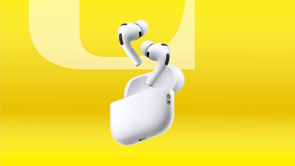 A pair of white earbuds and charging case against a yellow gradient CNET background.
