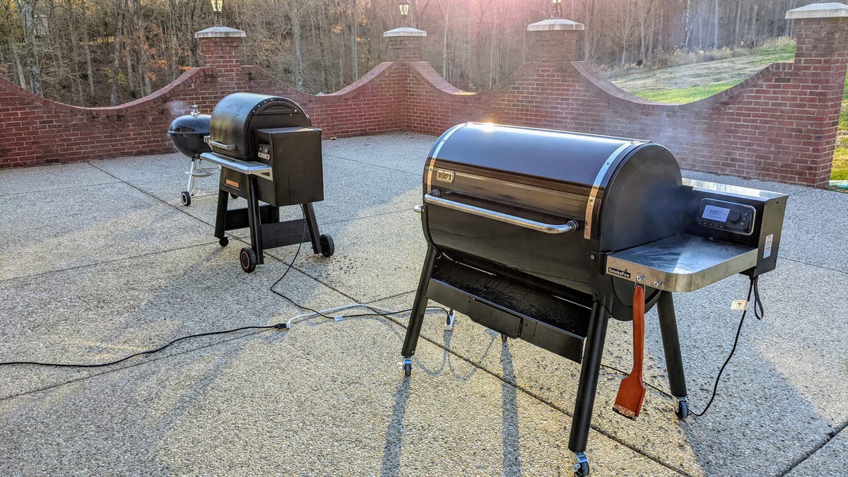 Two grills on a patio