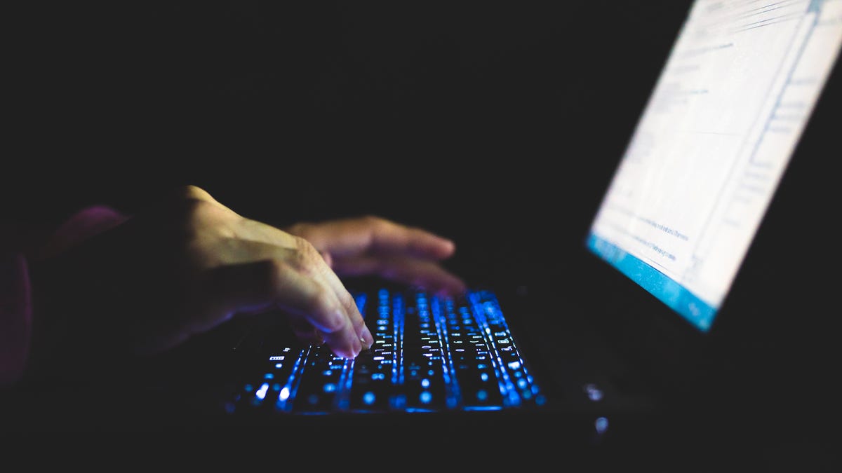 typing on laptop gettyimages-1051413784