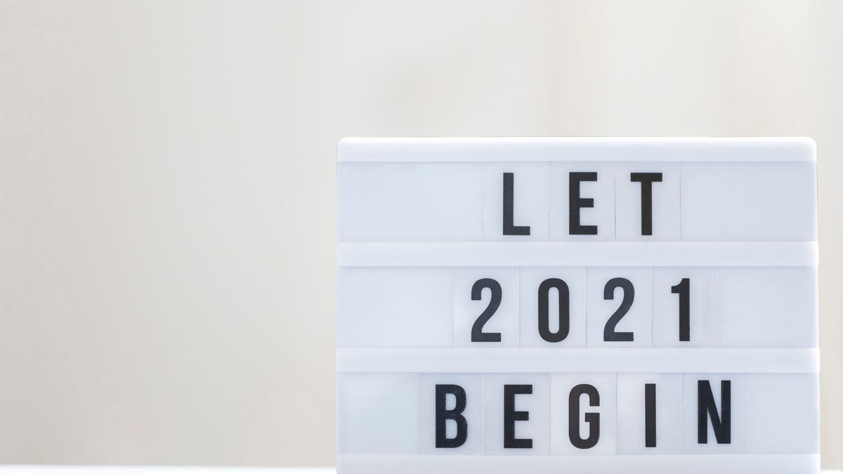A sign that says "Let 2021 begin"