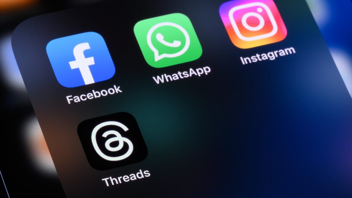 phone screen with facebook, whatsapp, instagram and threads apps showing