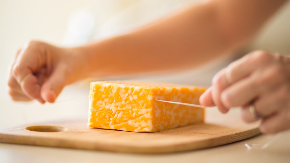 cutting cheese with. floss