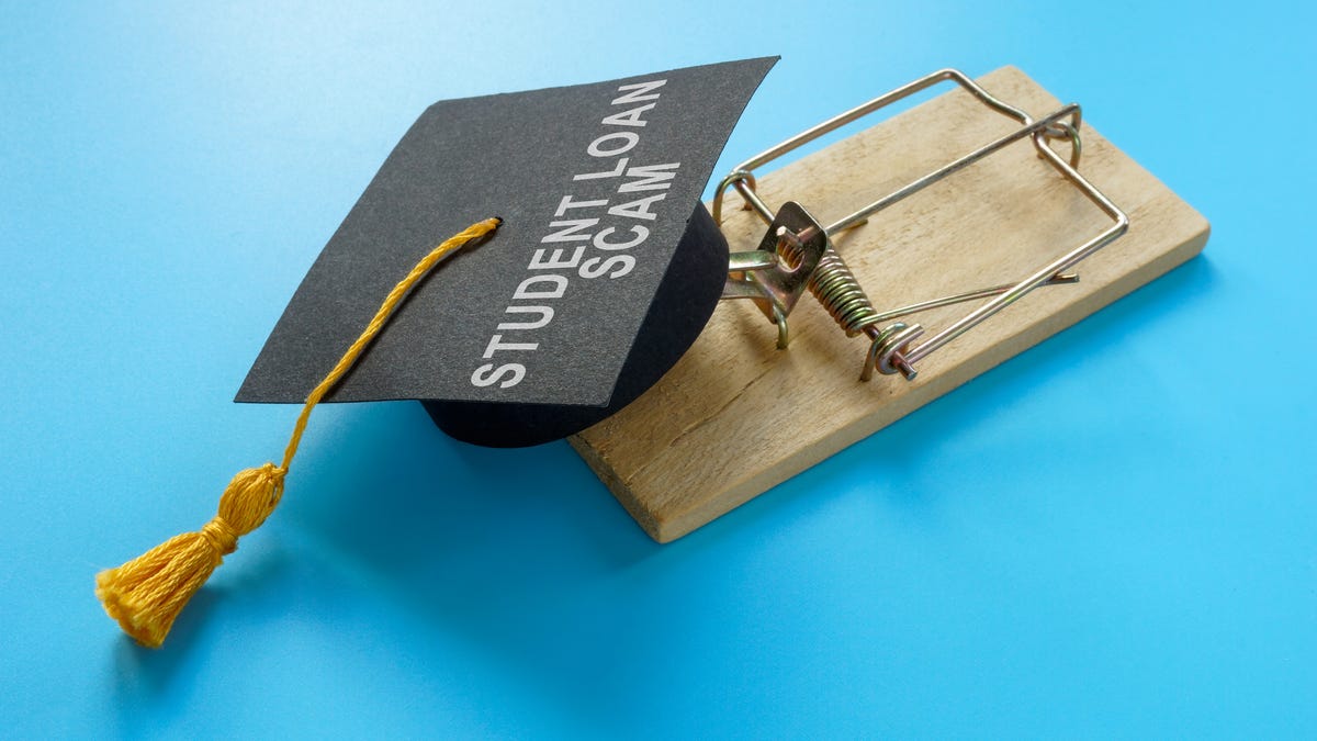 A graduation cap on a mousetrap.