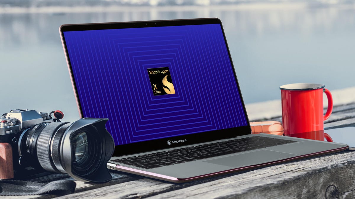 A laptop sits open with the Snapdragon X Elite logo centered on its screen.