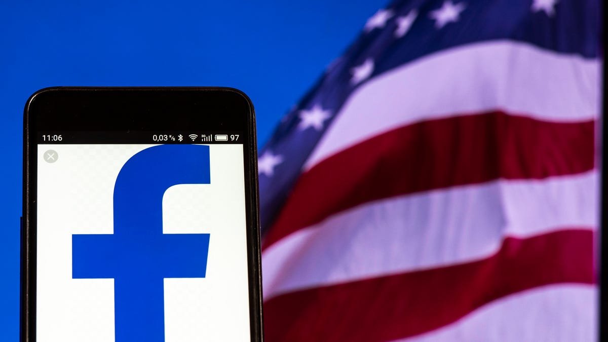 Facebook logo seen displayed on smart phone