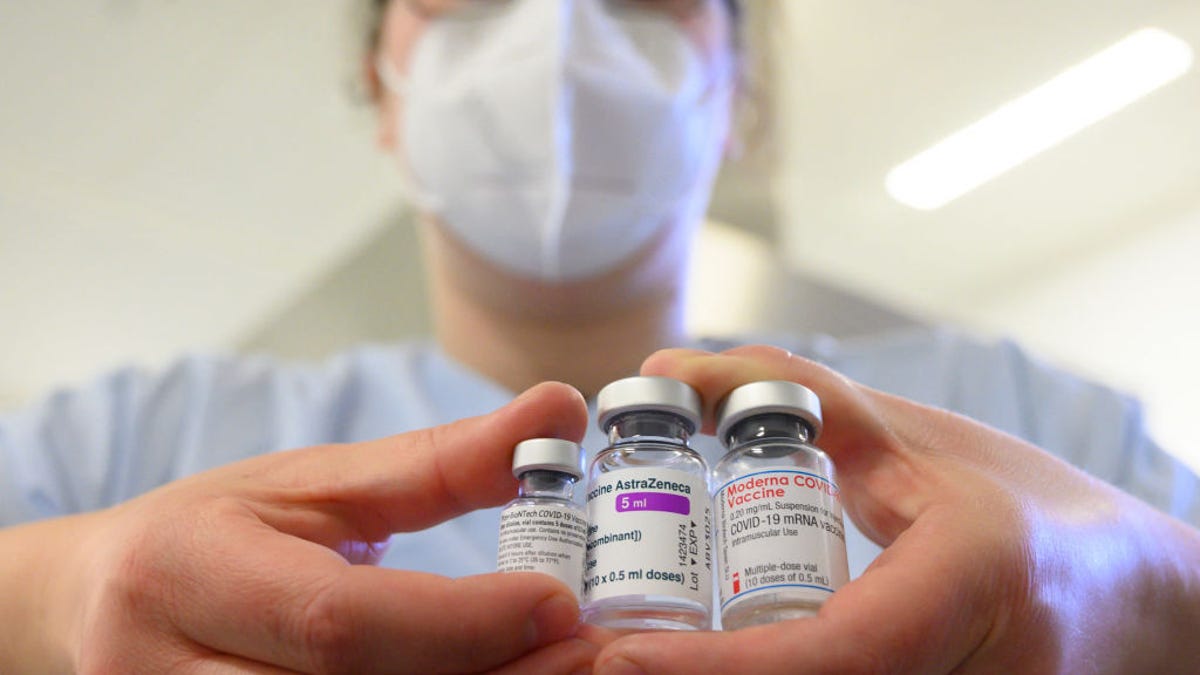 Nurse holds COVID vaccines