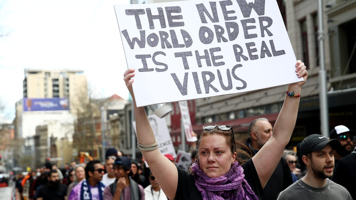Anti-lockdown and anti-vaccination protesters march in Sydney on July 24.