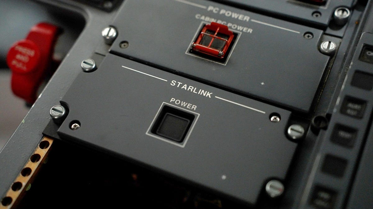A gray panel with a square switch that is labeled Starlink