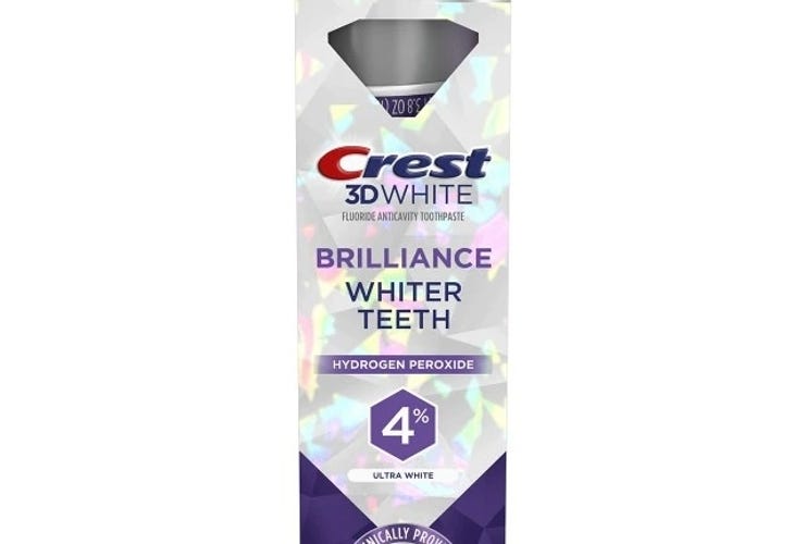 Crest 3D White Brilliance Pro Ultra White Toothpaste over a white background.