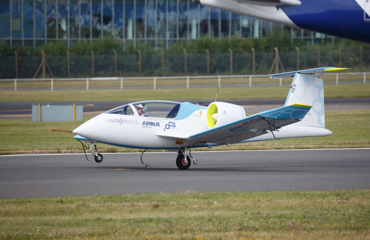The Airbus E-Fan lands at the Farnborough International Airshow in the UK. It's got a central wheel and smaller ones on the wings. The main wheel also can drive the plane more efficiently for taxing and the initial acceleration of takeoff.
